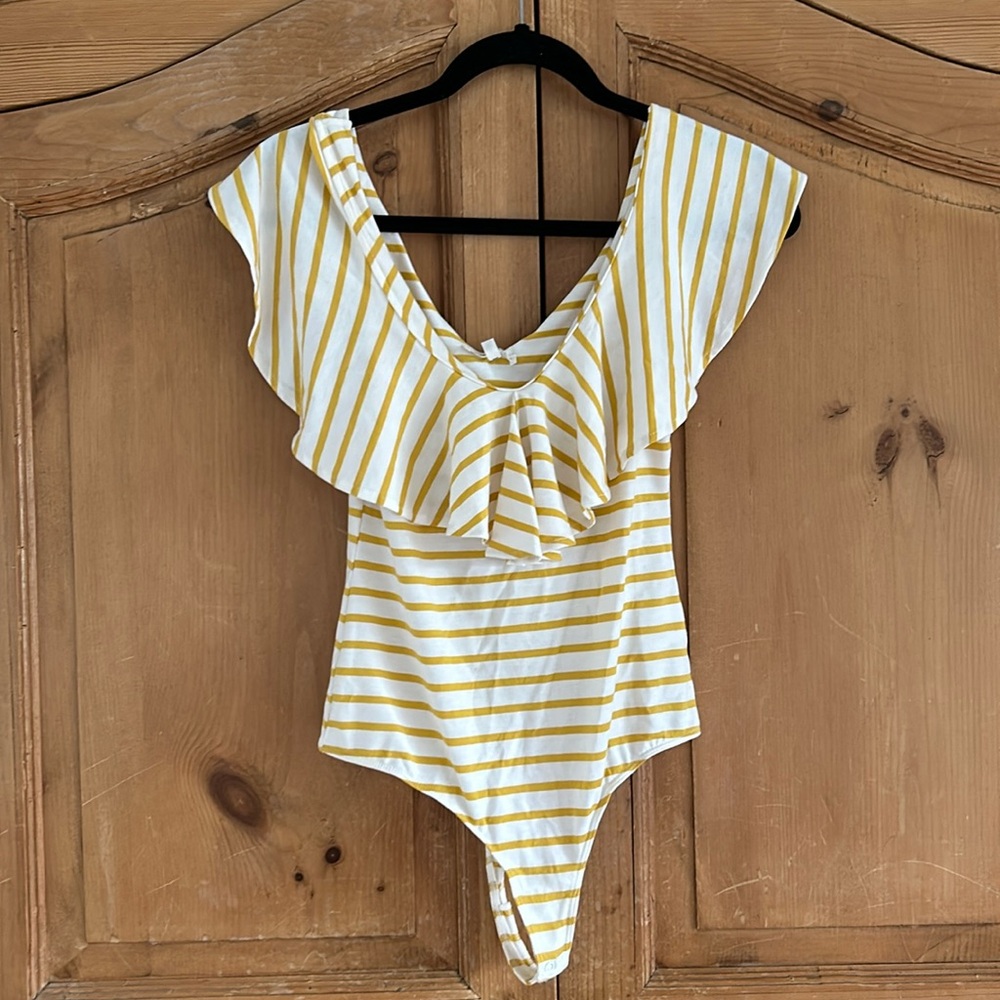 Adorable yellow and white ruffle body suit
